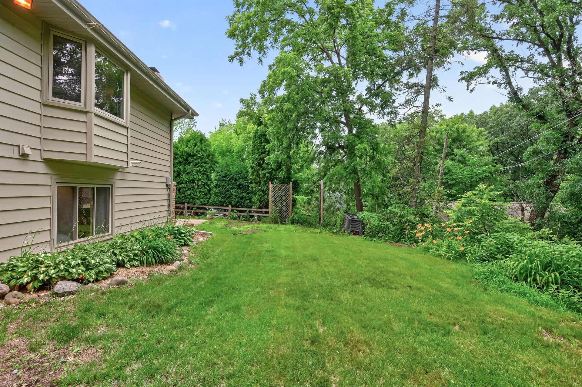 Beautiful private 1/2 acre lot in convenient Burnsville location