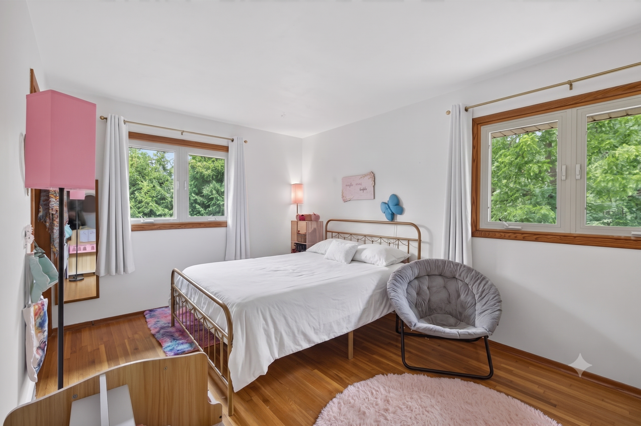 Main level: bedroom 1 (bedspread and curtains virtually staged)