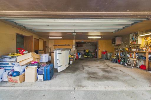 Huge 3-stall garage is insulated and heated. Notice the 3rd stall in the rear