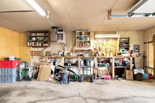 Lots of space to tinker in this 3-stall garage with workshop space