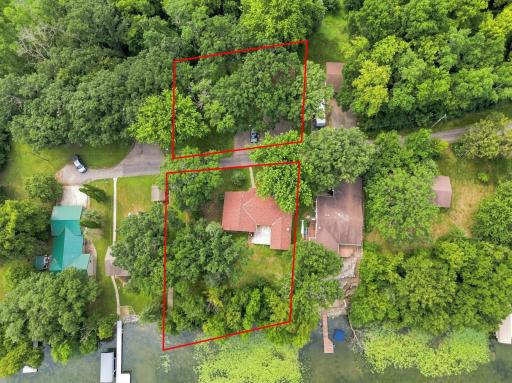 Home in foreground. Septic system is compliant and is located on the southeast of property