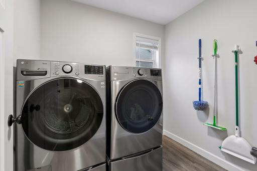 Conveniently located just off the garage entry, the laundry room includes the washer and dryer to make moving in even easier.