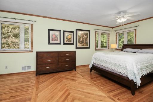 HUGE bedroom was originally two rooms, but knocked down a wall to create this amazing space.