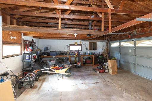 Attached two car garage with work bench and storage. Storage above the garage in the rafters too.
