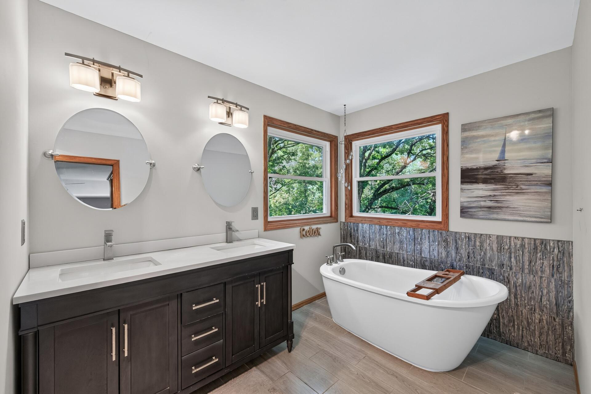 Spacious Primary Suite featuring two walk-in closets and a private en suite bath.