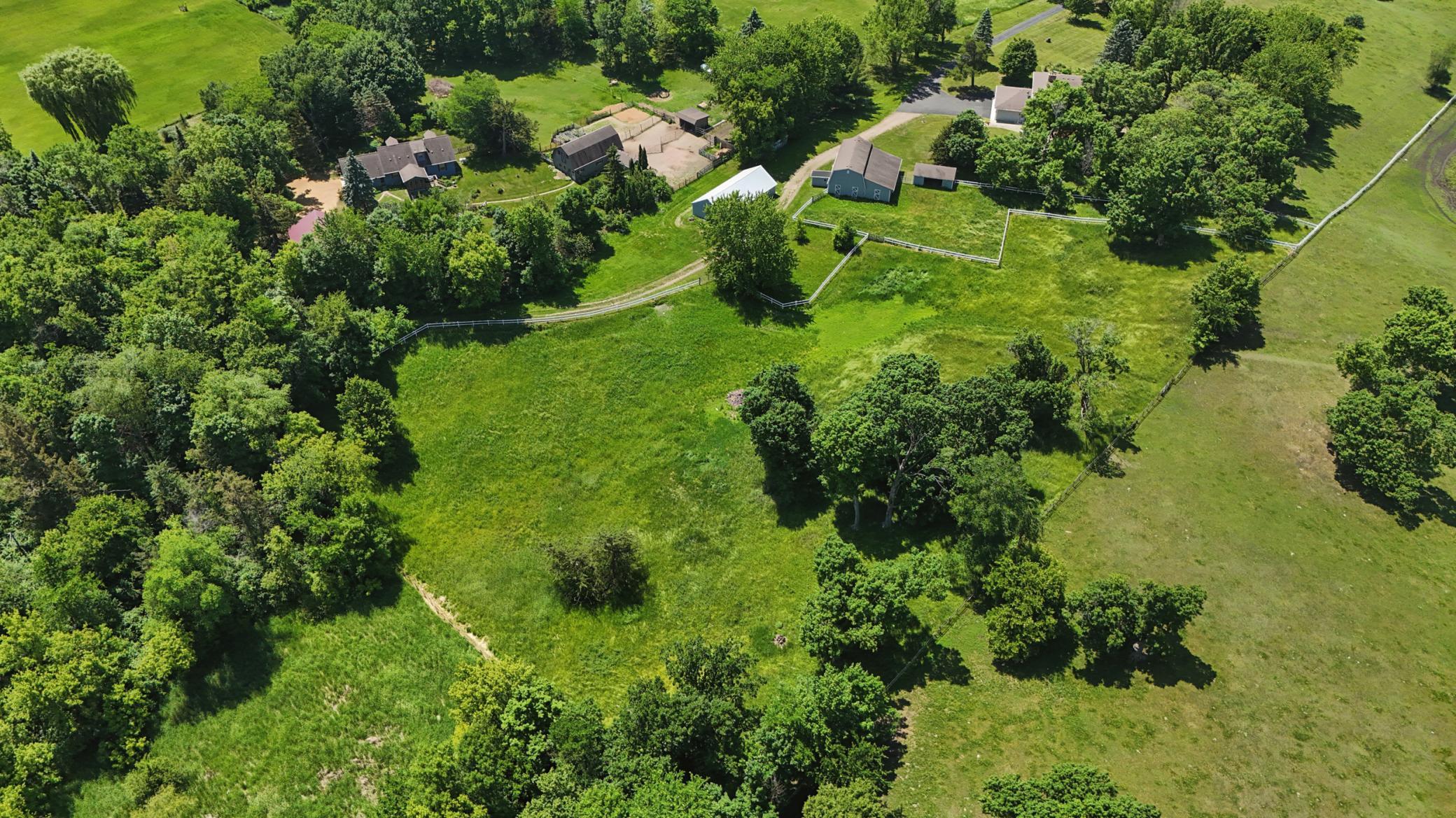Expansive acreage showcases rolling land, open pasture, and serene countryside views.