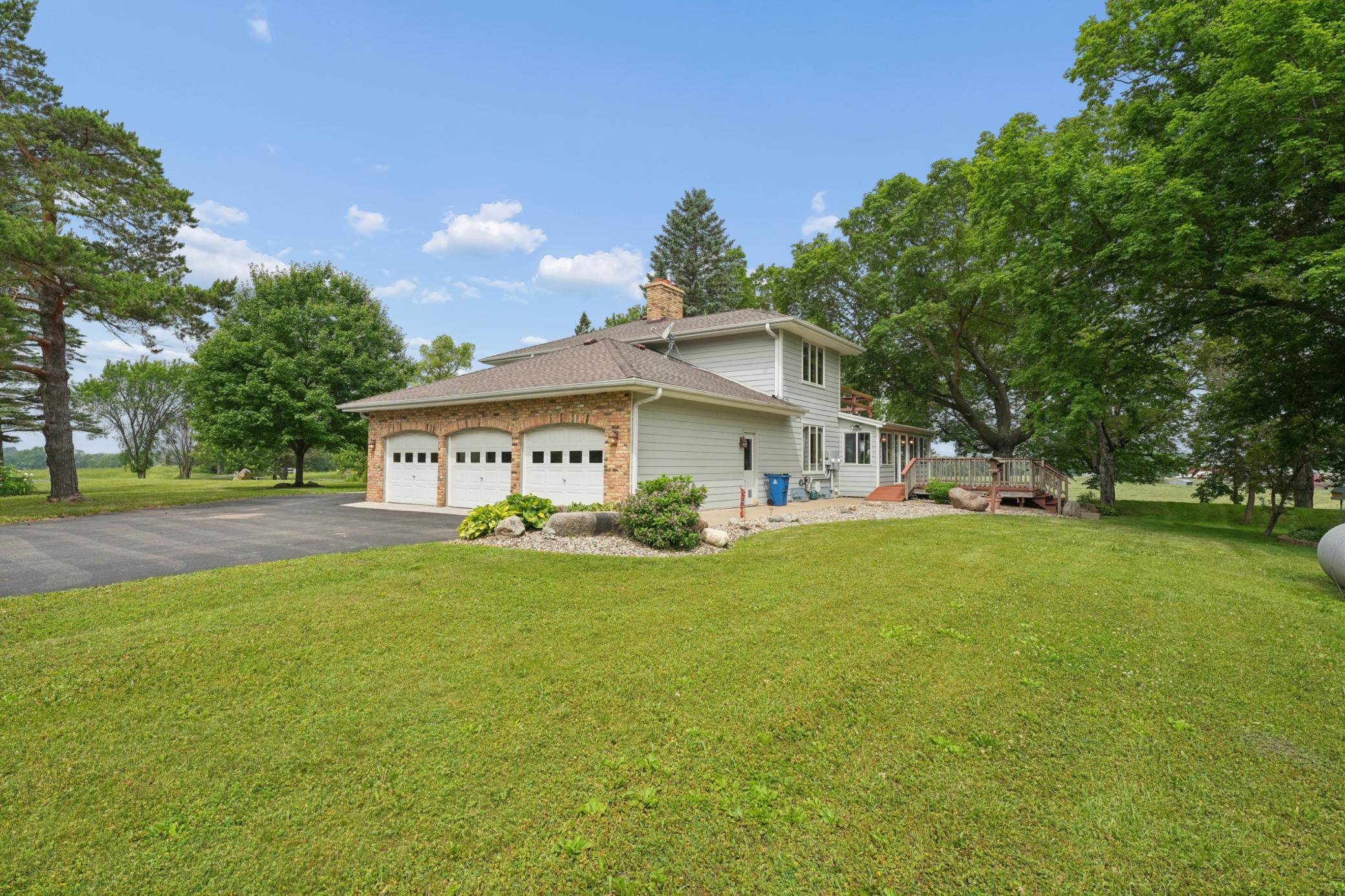 Welcome home—this beautifully maintained property offers privacy, space, and timeless curb appeal.