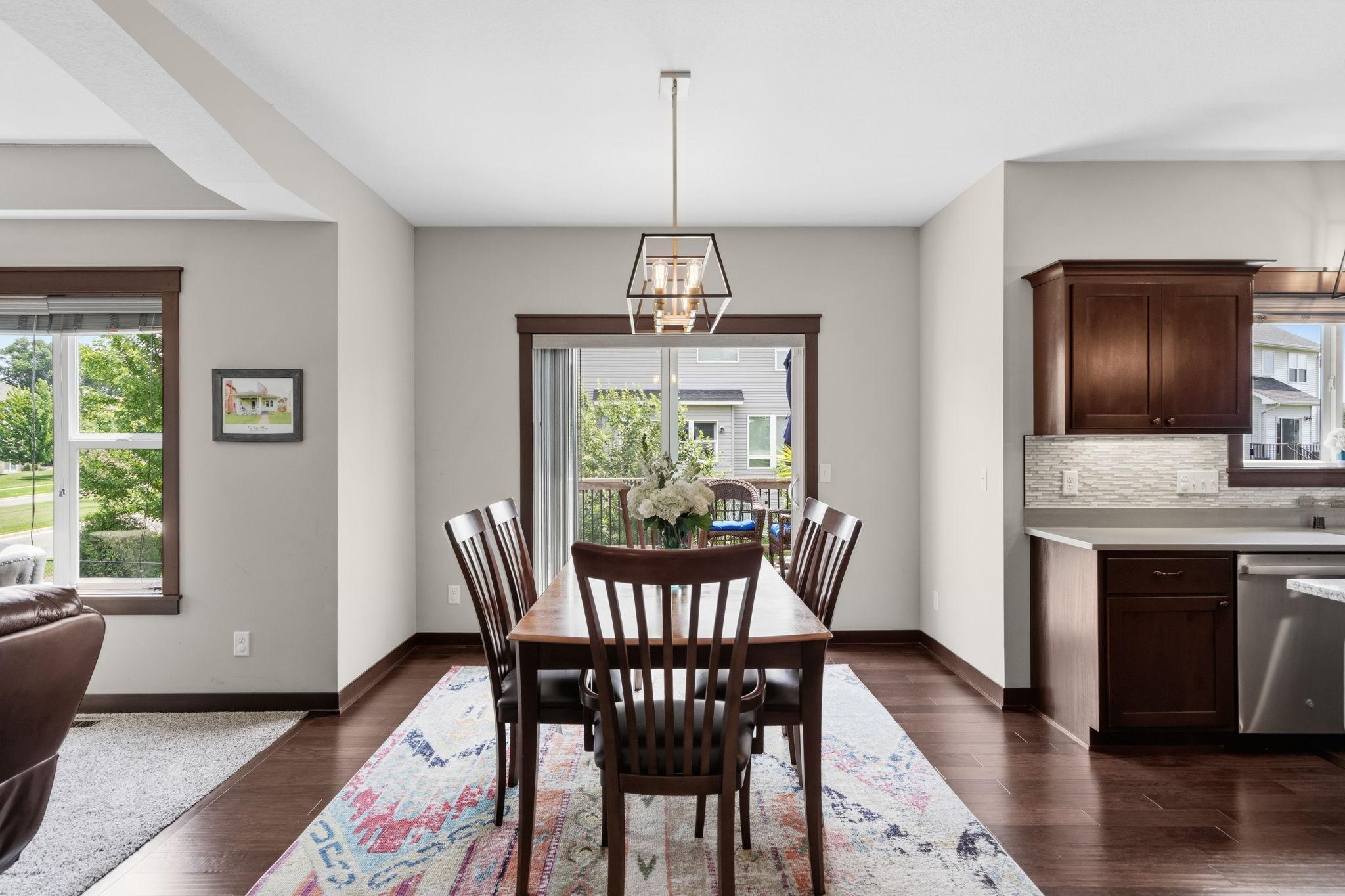 Informal dining area with large window and abundant natural light.