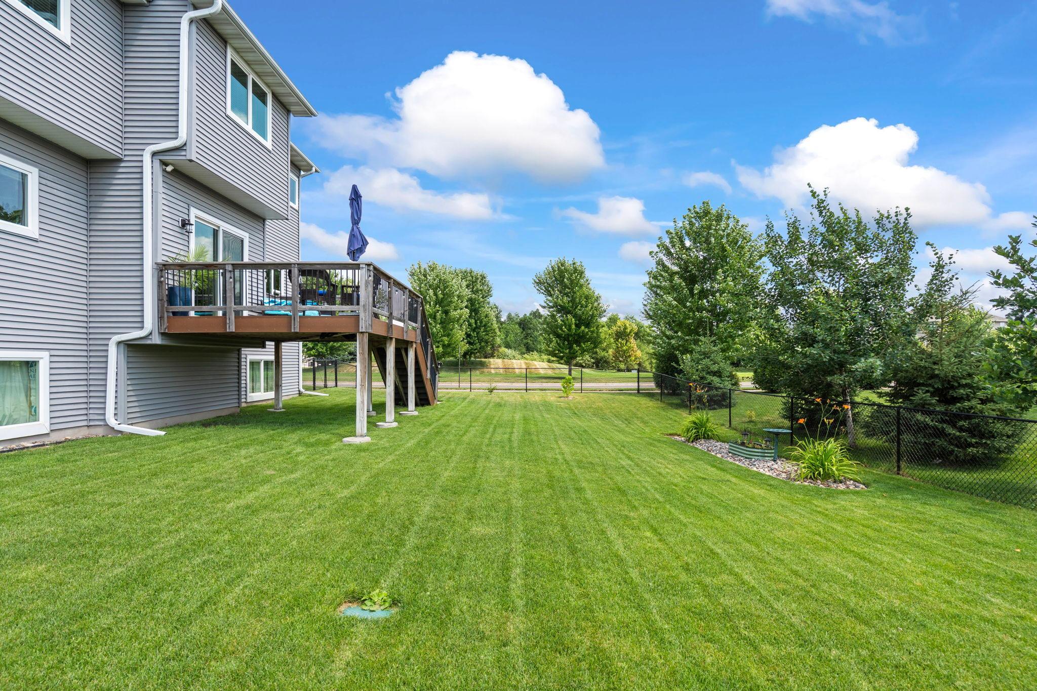 Fully fenced backyard offering plenty of space for outdoor activities and pets.