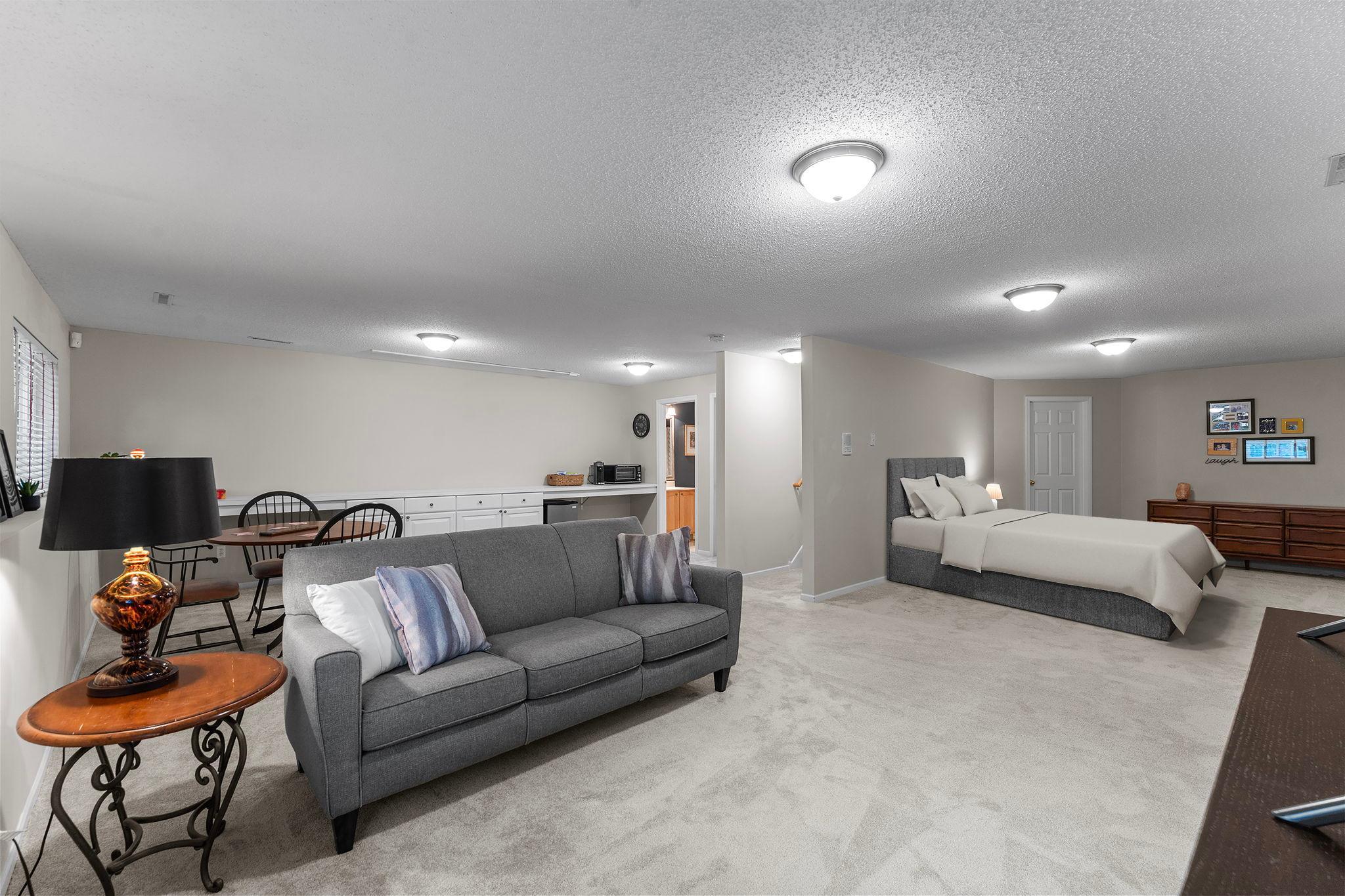 The finished lower level provides even more living space with carpeting throughout.