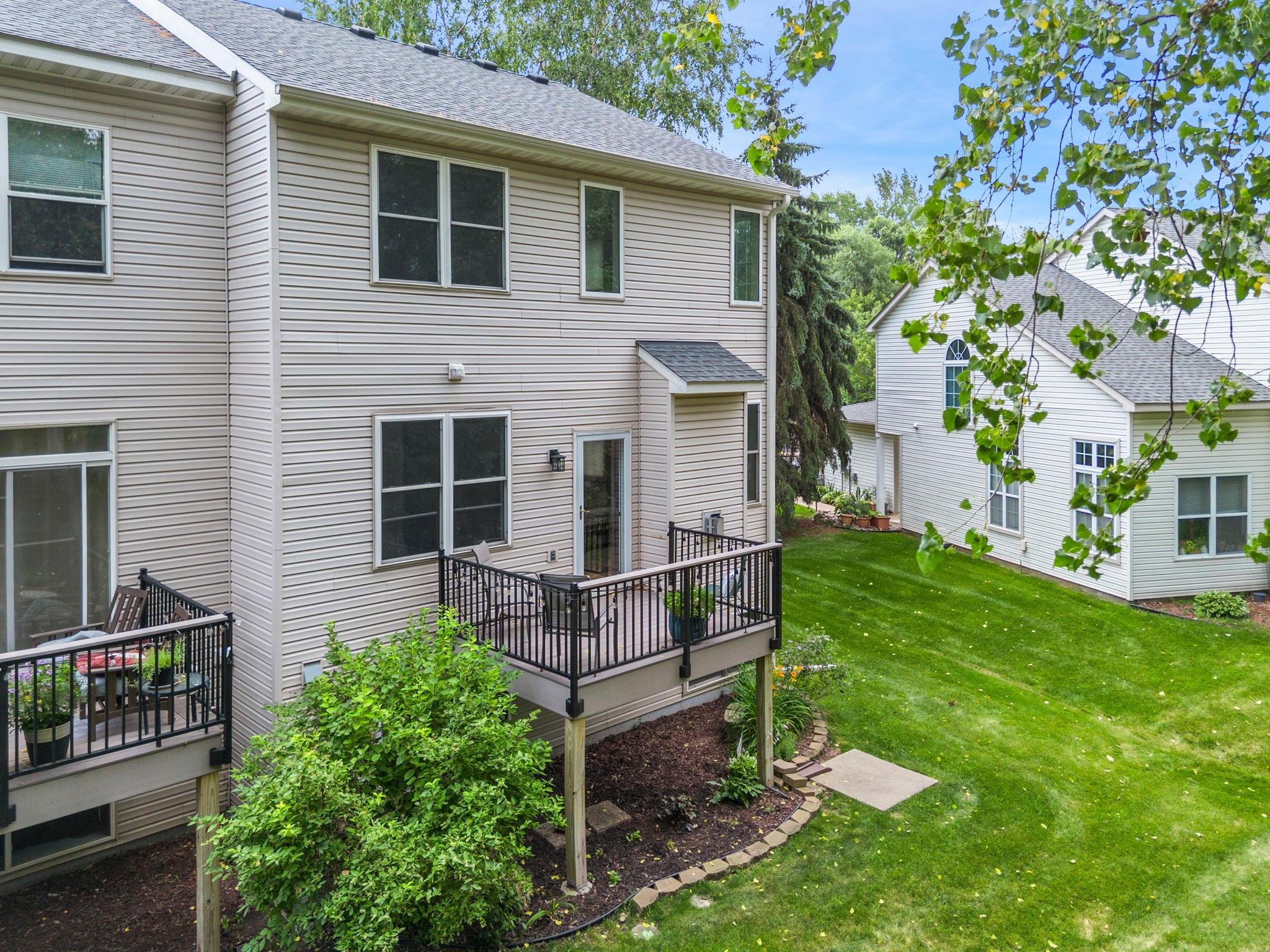 Additional updates include a new deck entry exterior door and full-glass Larson storm door with screen (2021), a new Anderson front entry screen door (2026), carpeting throughout (2020), and a new water heater (2019).