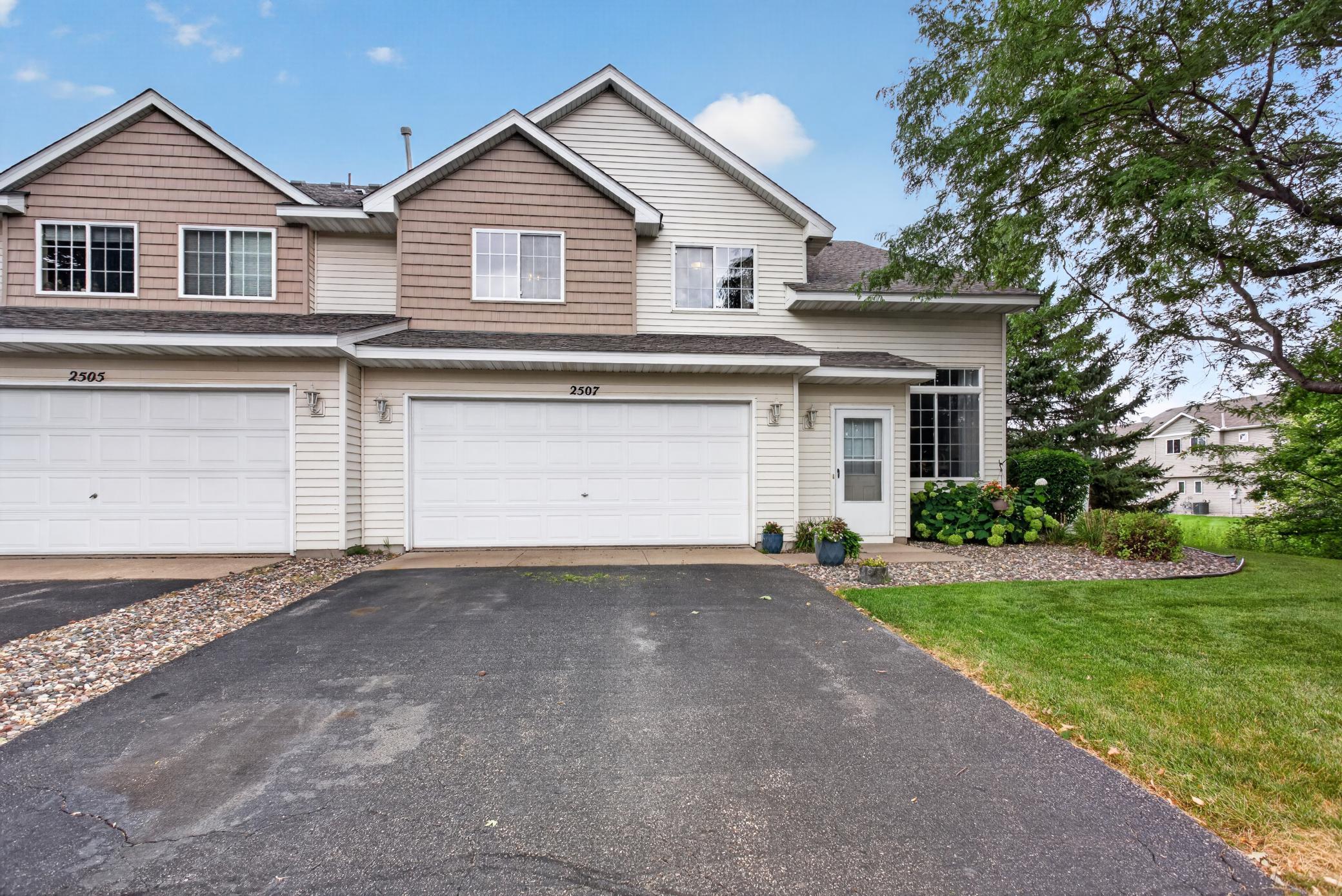 Great end unit with beautiful green space