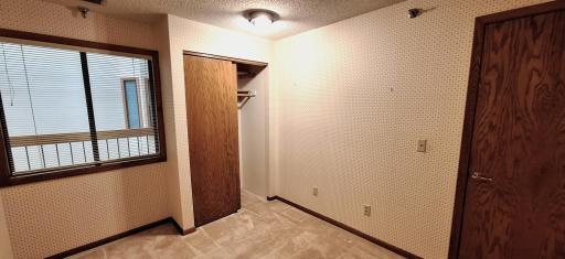 2nd bedroom - window to common area.jpg