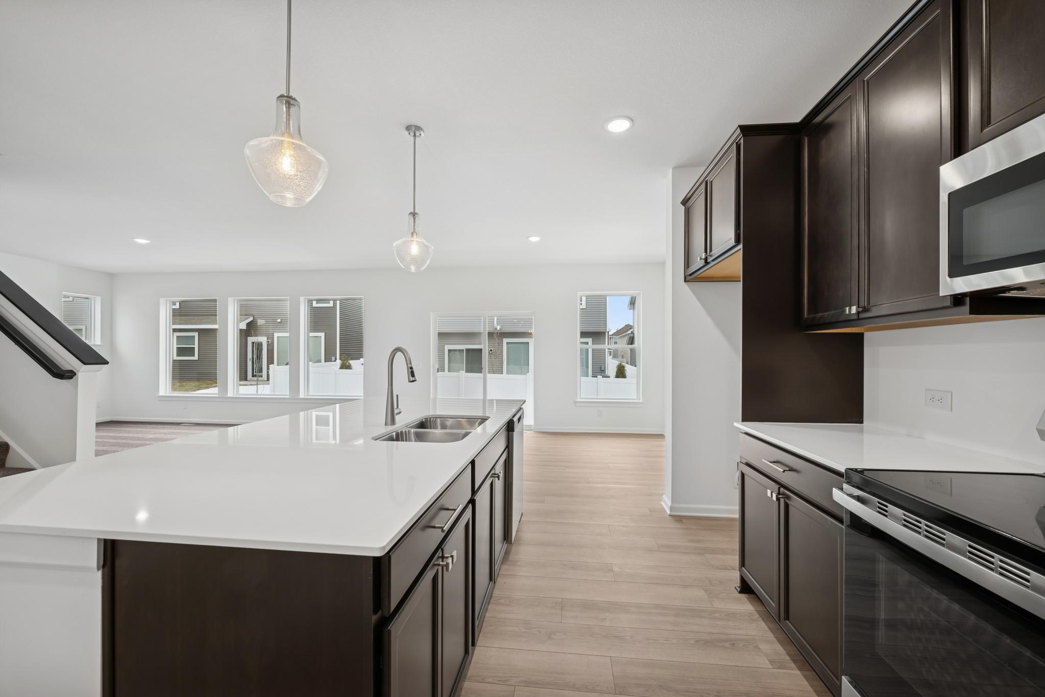 9' ceilings and large unobstructed views enhance the natural light! Pictures are of a previous Pryor home.