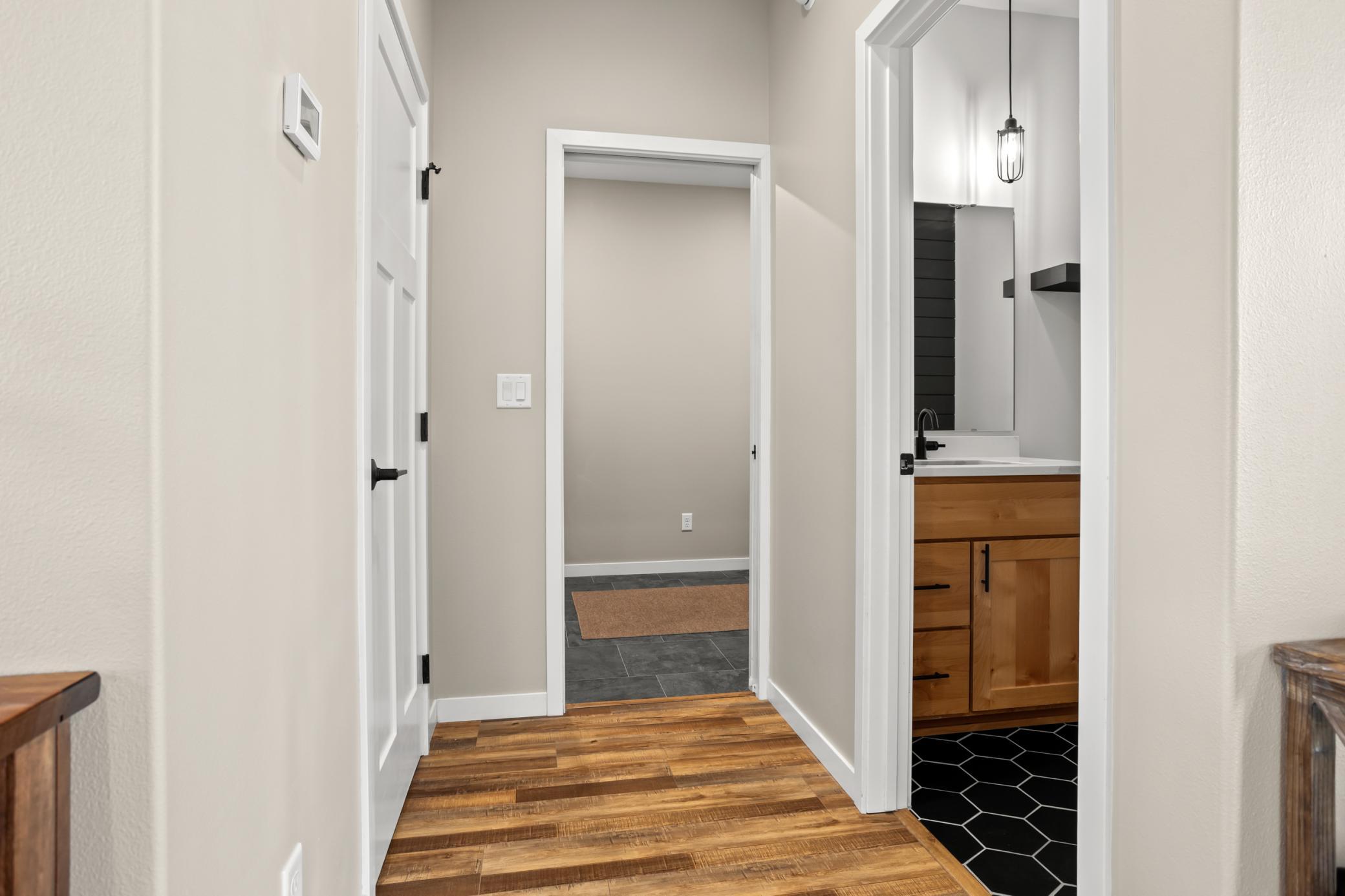 Hallway to bathroom/laundry/garage
