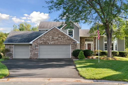 Welcome to 8659 Quinwood Lane N, Maple Grove!
