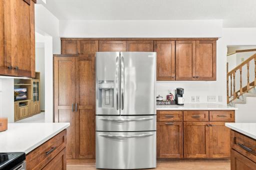 The pantry has pull out drawers.