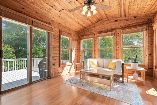 The 3-season porch has a patio door to the deck.