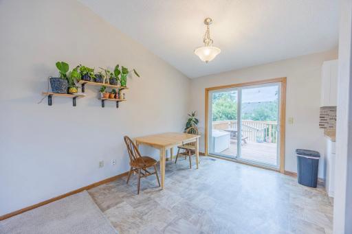 Eat-in kitchen and large deck for indoor or outdoor dining (no AI)