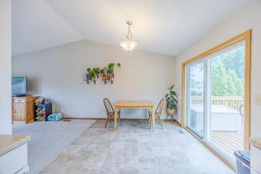 Neutral paint and vaulted ceilings help open up the space (no AI)