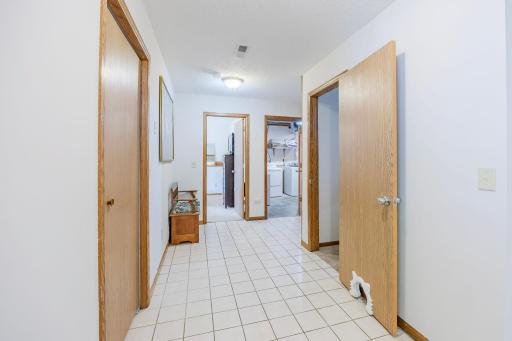 Downstairs hallway is nice and wide for easily moving those big, comfy couches into the family room! (No AI)