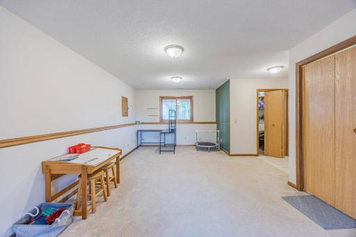 Family room, window looks out to the back yard (no AI)