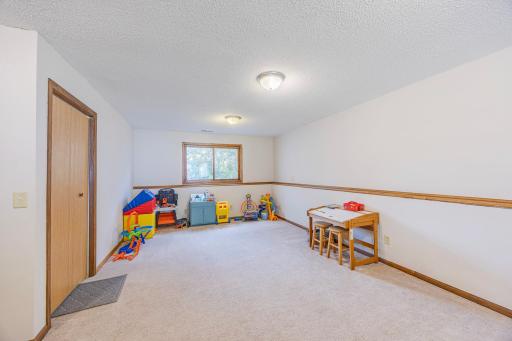 Family room, window looks out at front lawn