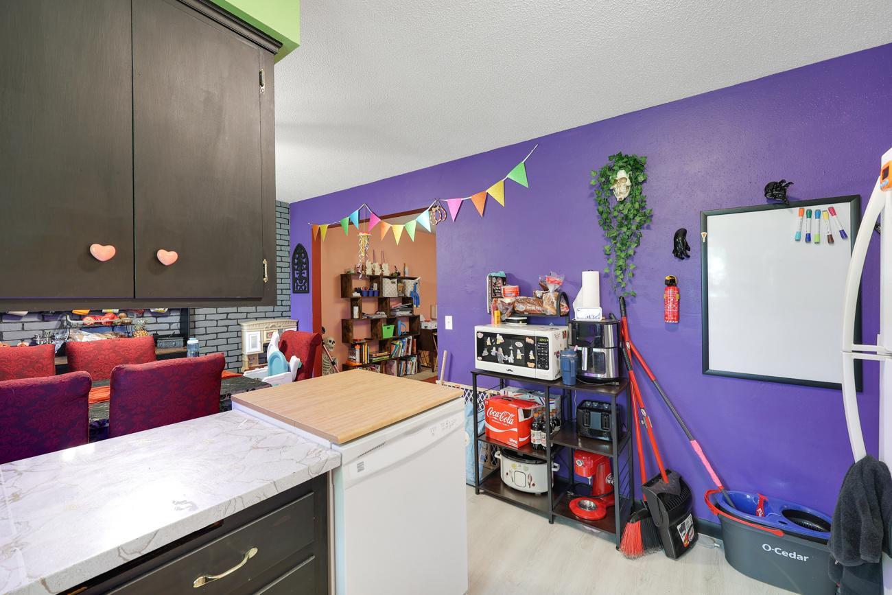 Bright kitchen, updated luxury vinyl plank flooring