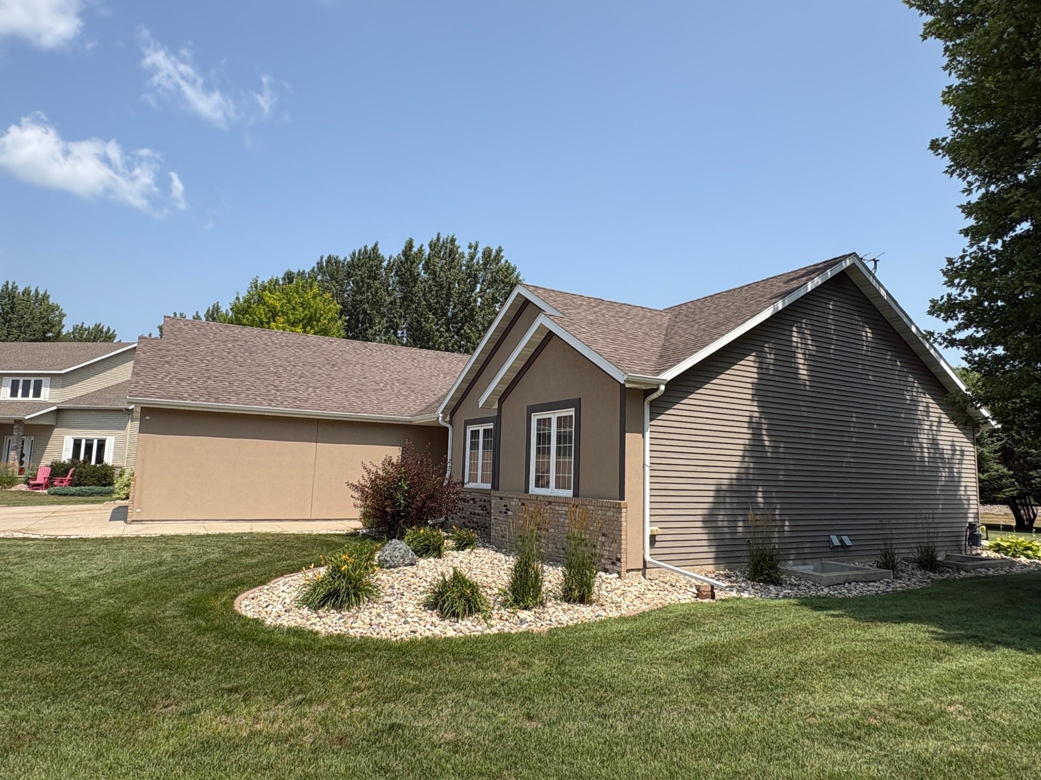 Steel, Stucco And Brick Exterior.JPG