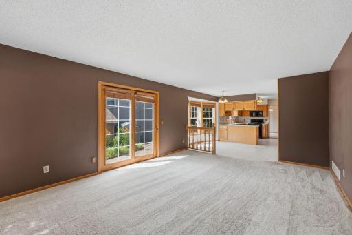 Large windows and patio doorsnbring the outdoors in.