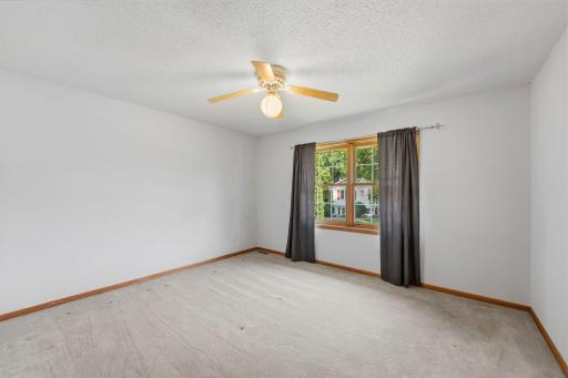 One of 3 more bedrooms on the upper level.