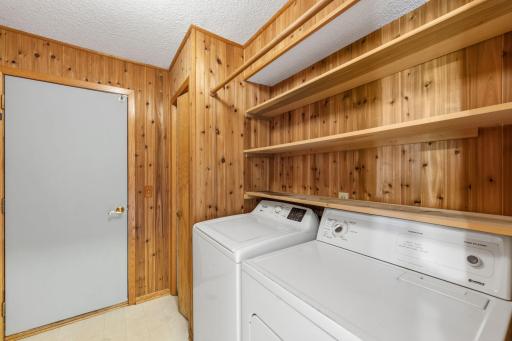 Minnesotans need an entry closet for every day entering. The main floor laundry is conveniently located near the hub of the house.