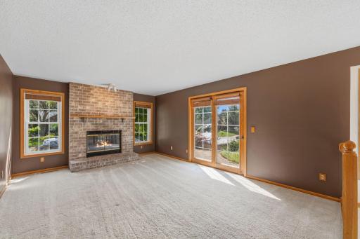 Gather around the cozy brick fireplace on cool Minnesota evenings...if it ever cools off!