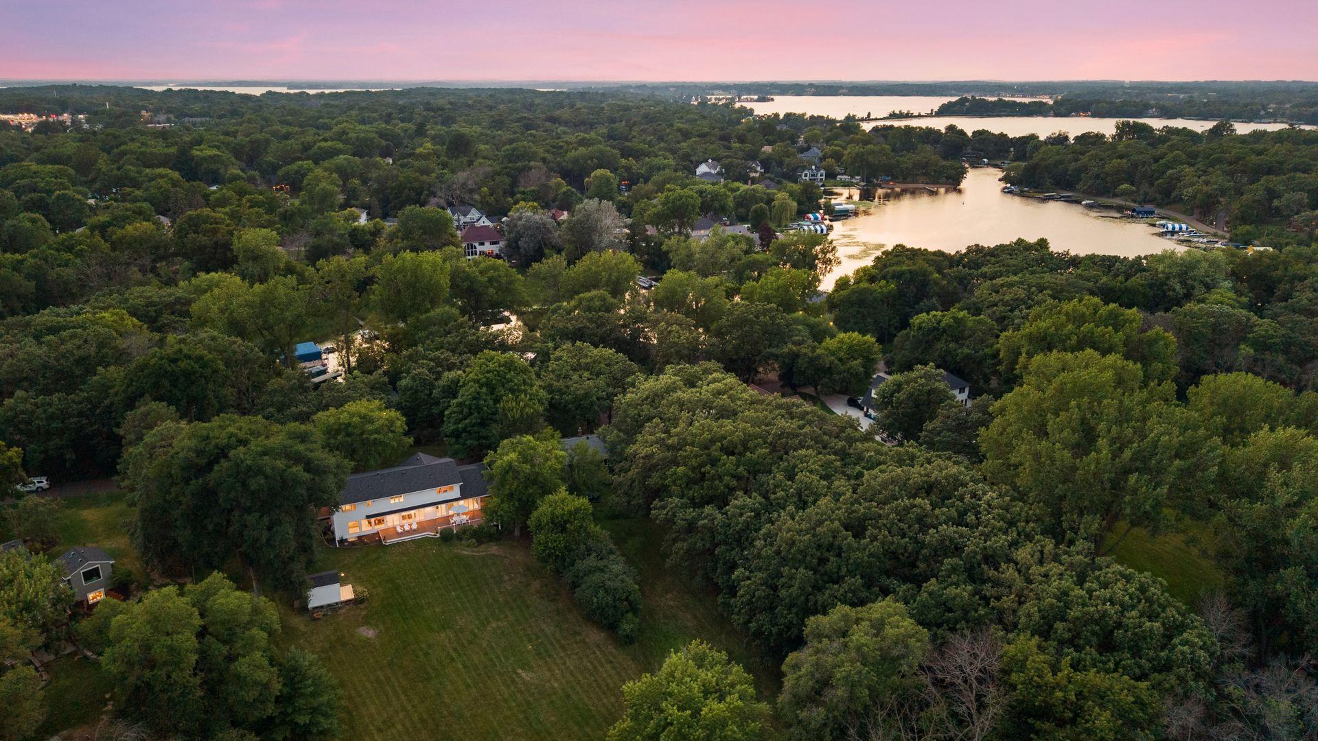 Located within the award-winning Minnetonka School District, this remarkable property presents a rare opportunity to experience the very best of luxury lake living.