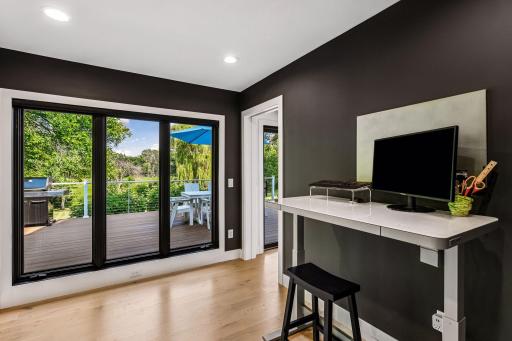 A private office, mudroom, and powder room complete the main level.