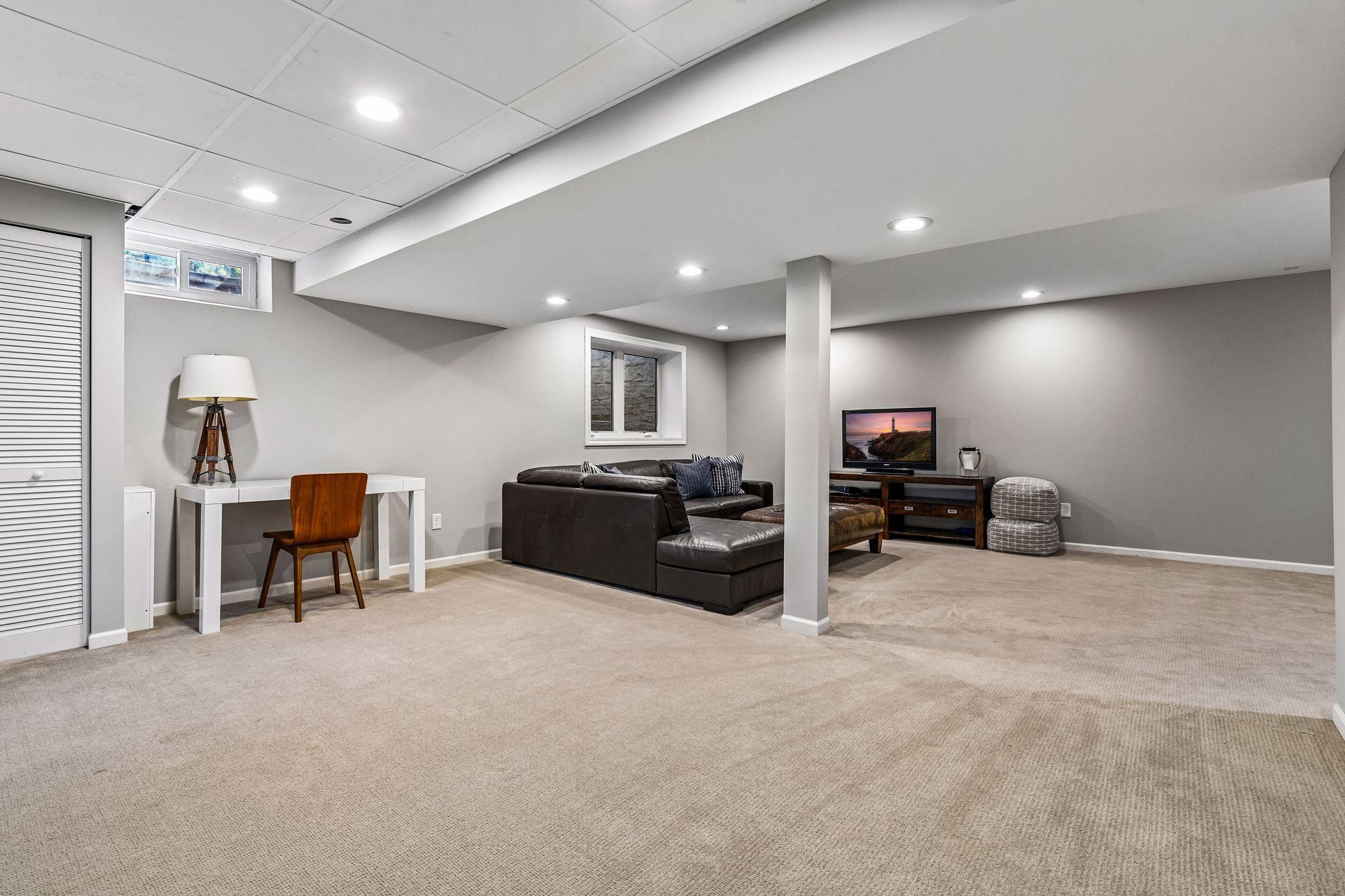 The lower level expands the home's living space with a spacious family room and game area.