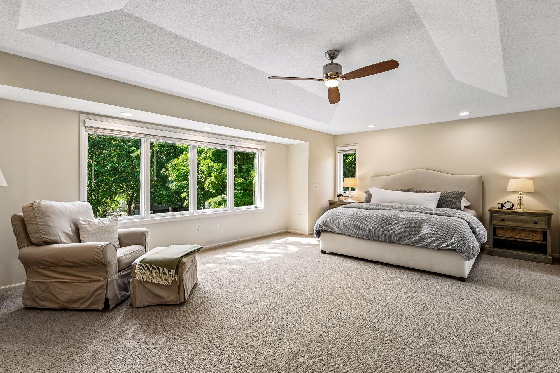Upstairs, the luxurious primary suite offers a private office with sliding doors, oversized walk-in closet with laundry, and spa-inspired bathroom featuring a soaking tub and walk-in shower.