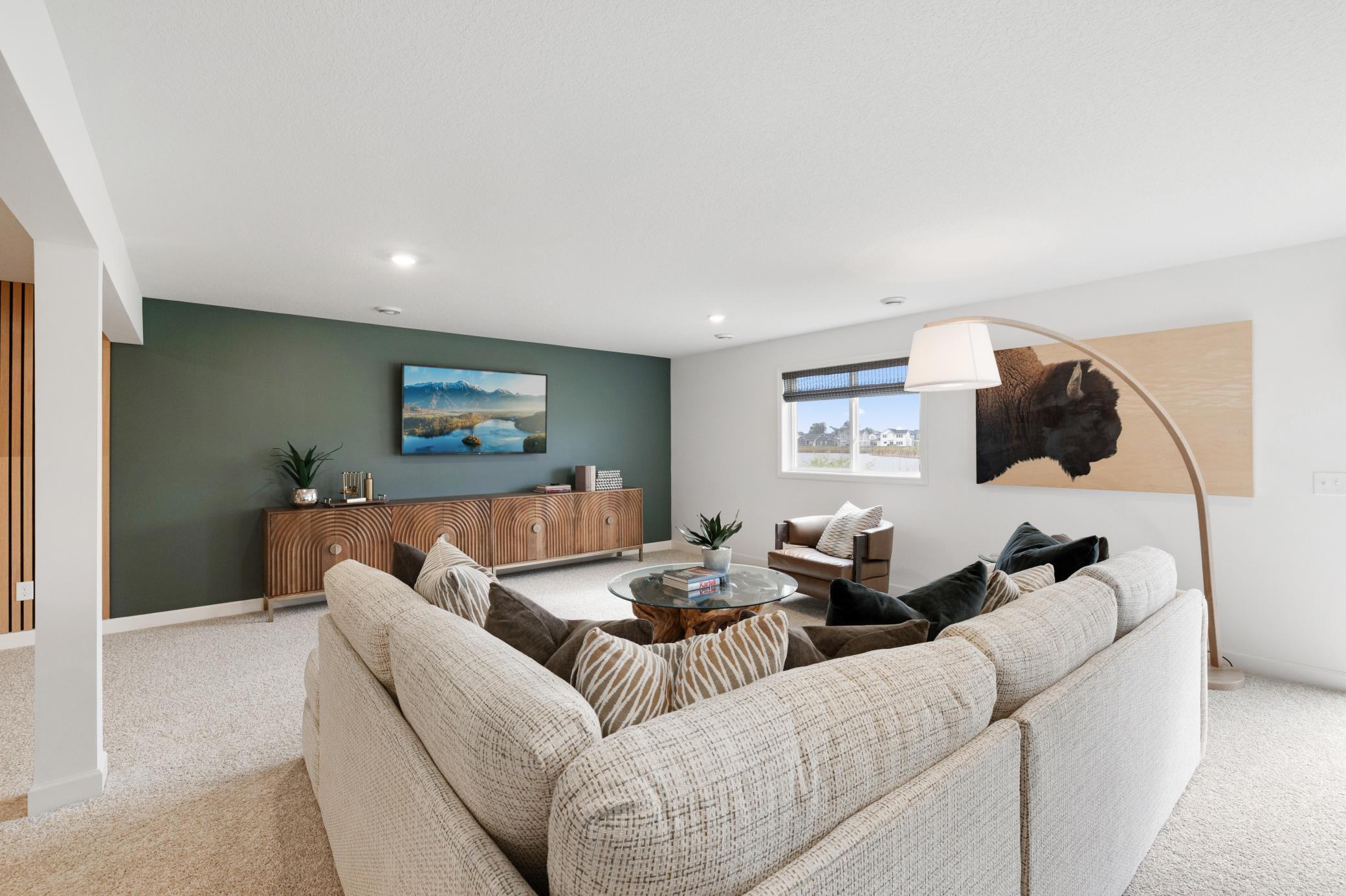 (Photo of a decorated model, actual home's finishes will vary slightly)