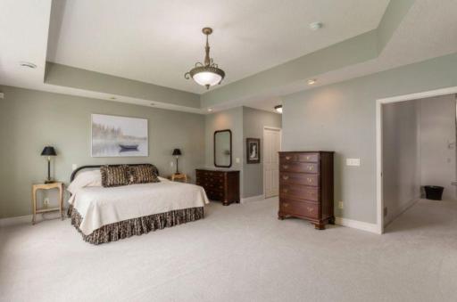 Large owners' suite with attached closets and bathroom