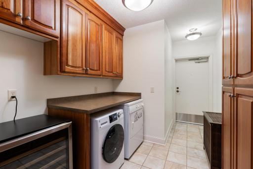 Large laundry room and mud room that leads right to the lake