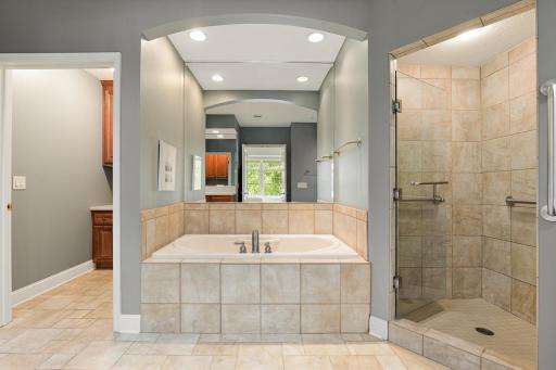 Built in bath tub and separate shower in primary bath.