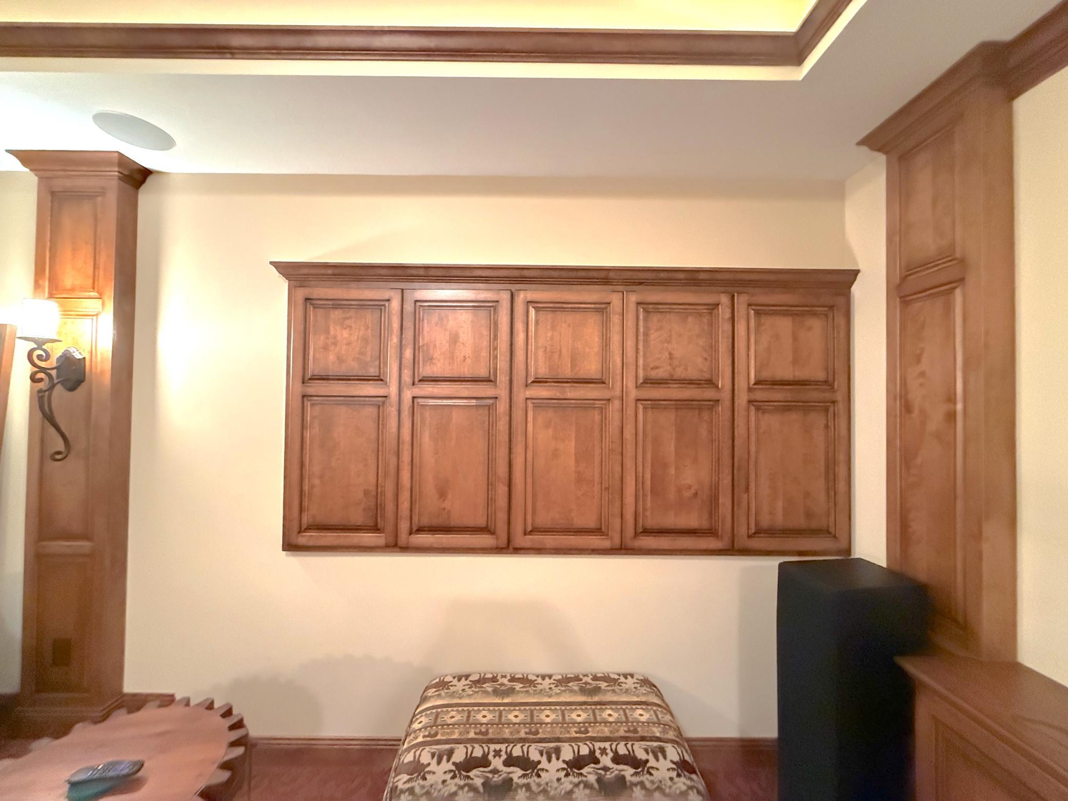 Even the utility spaces have been thoughtfully integrated with custom woodwork, blending functionality seamlessly into the home's design.