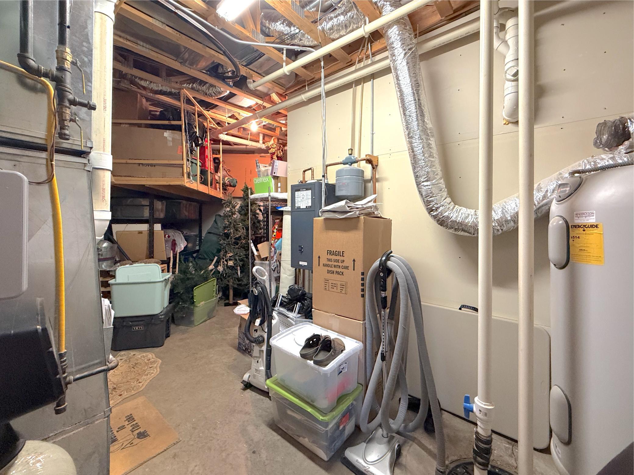 Expansive utility room in lower level, with access to lakeside garage.