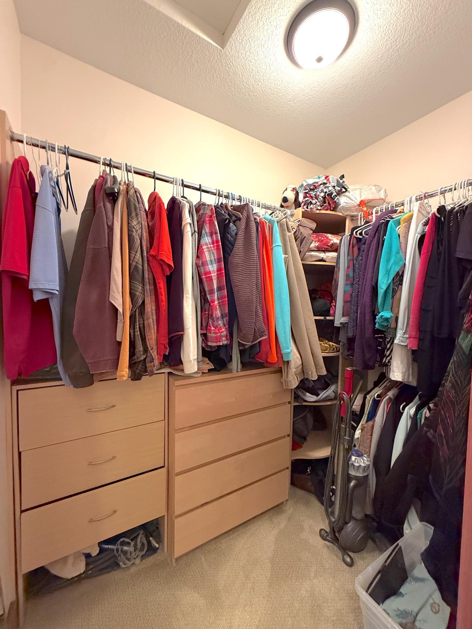 Enjoy the convenience of dual walk-in closets, offering ample space and privacy within the luxurious primary retreat.