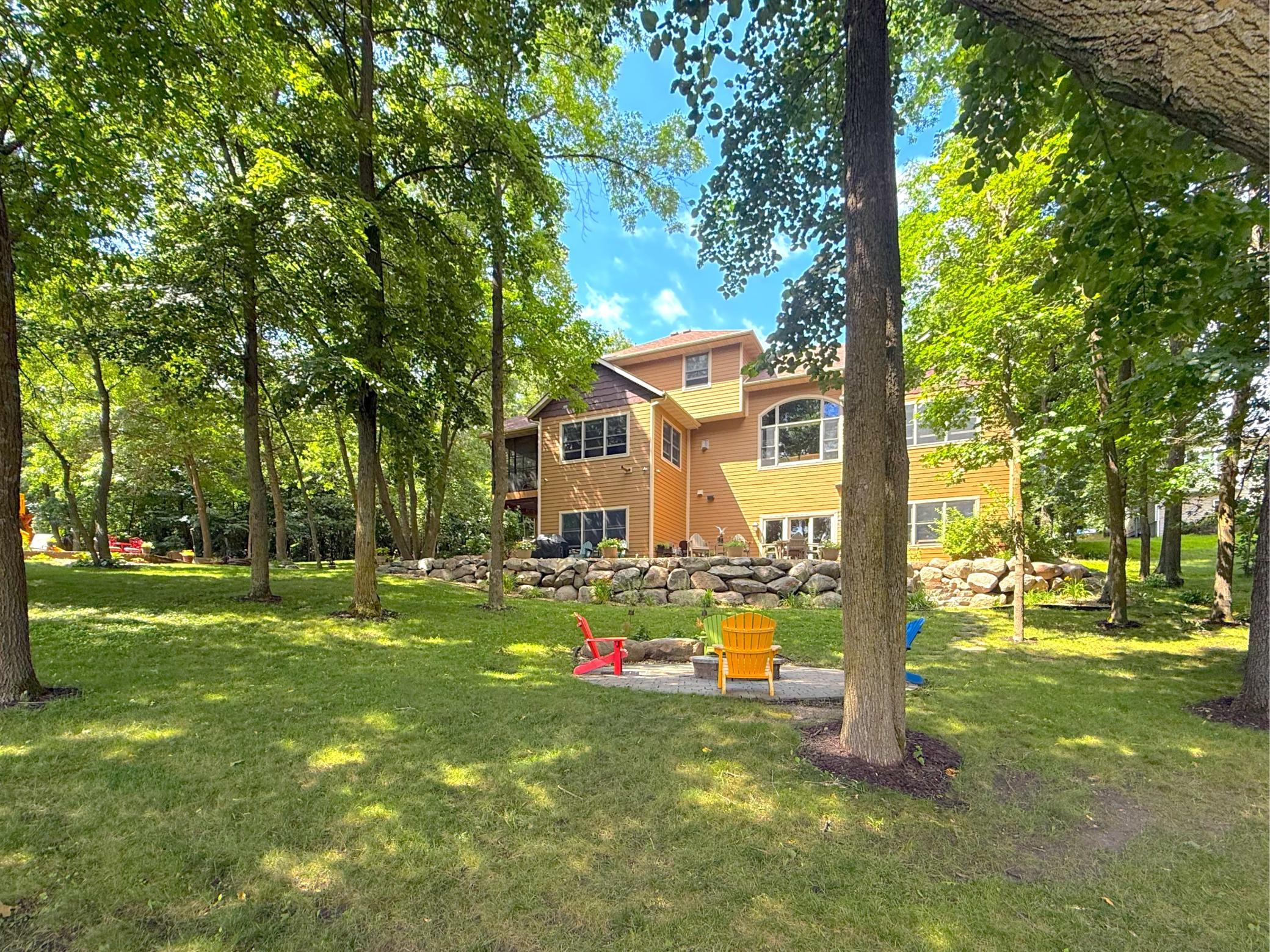 Countless outdoor entertaining spots complete this one-of-a-kind Lake Louisa property, offering the perfect blend of privacy, natural beauty, and unforgettable lake living.