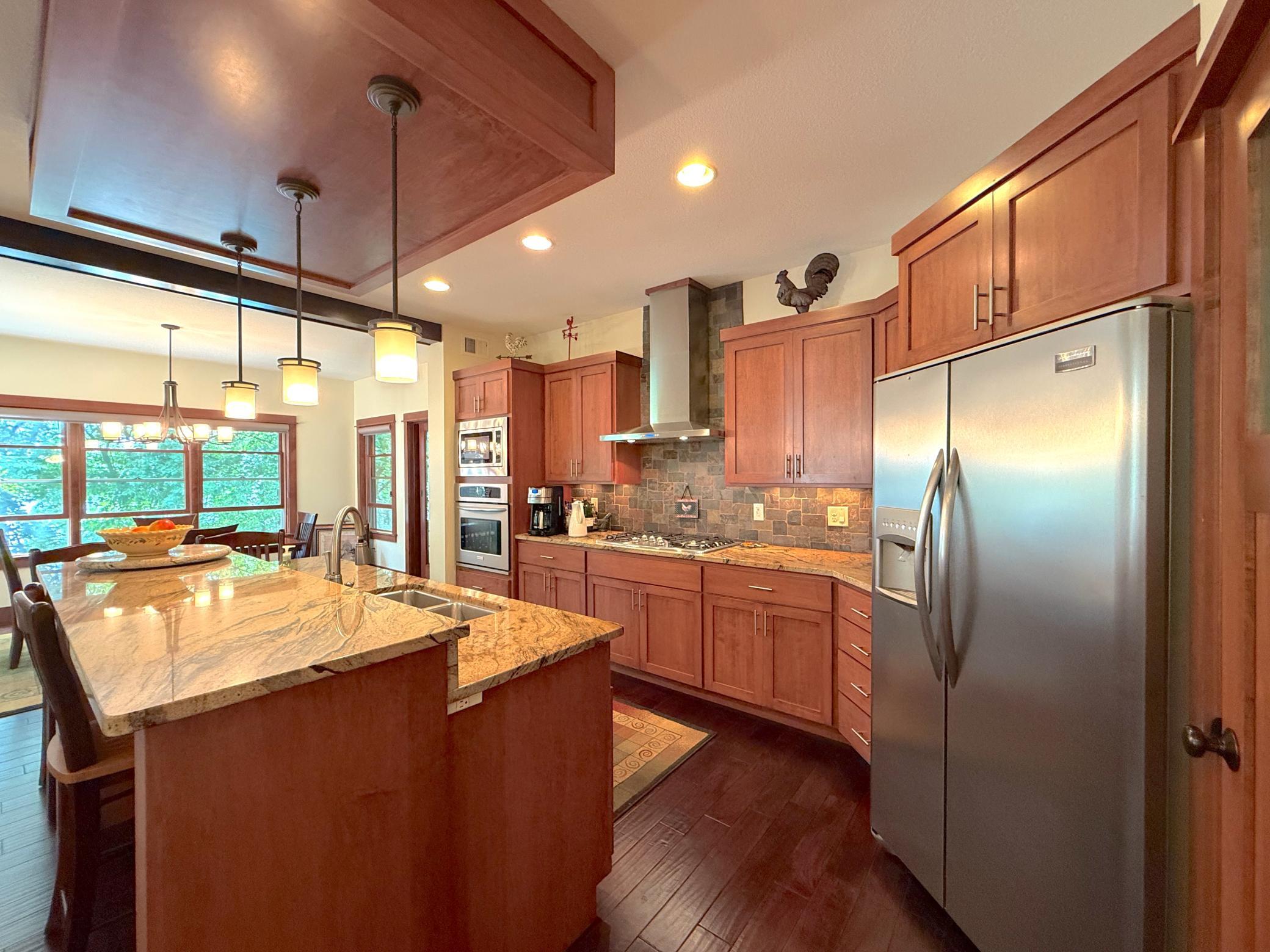 Thoughtfully designed for everyday living and entertaining, this beautiful kitchen features premium finishes and an open layout that connects seamlessly to the dining area.