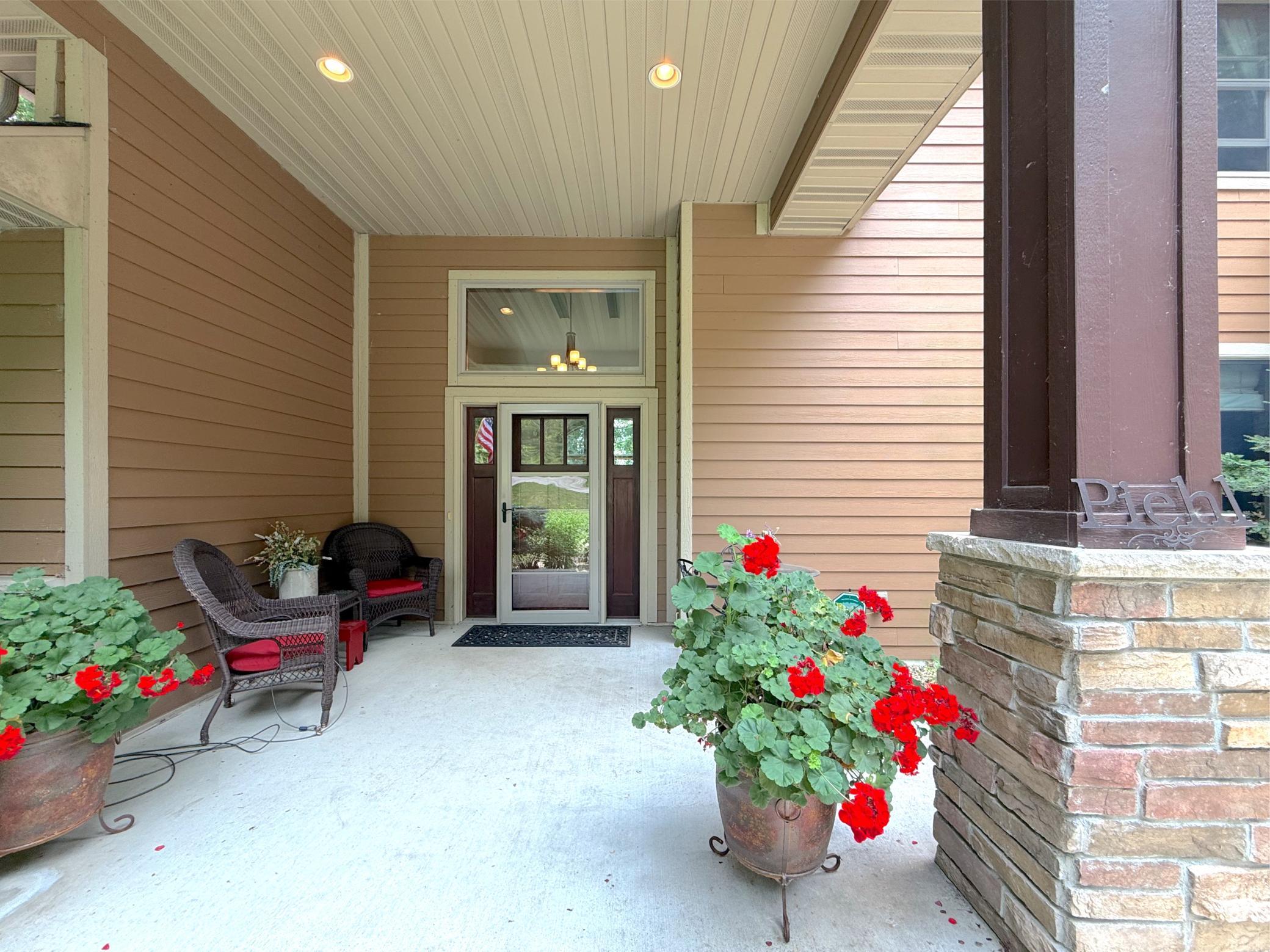 A welcoming covered front entry sets the tone for the home, offering impressive curb appeal and a warm first impression.