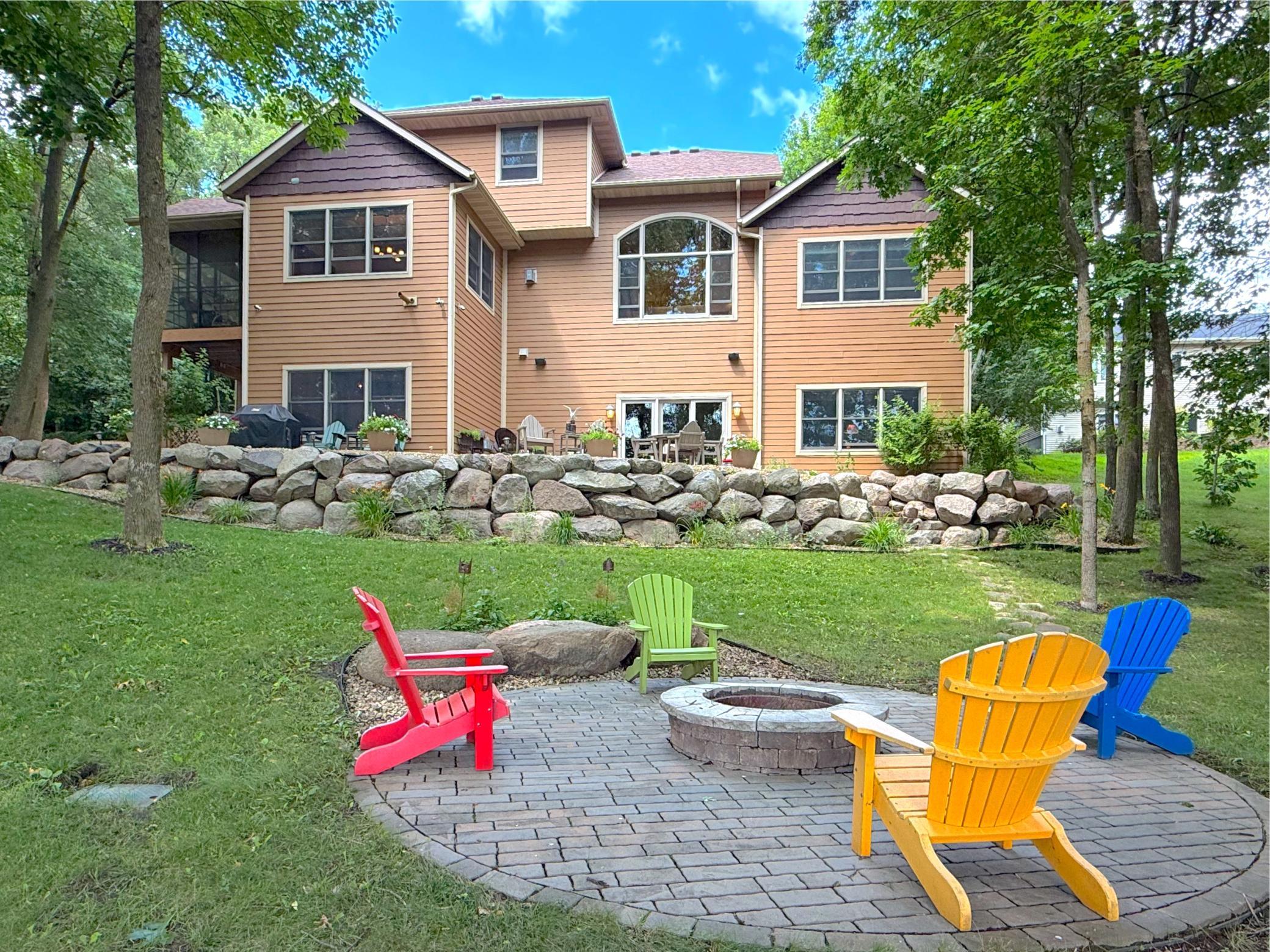With walkout access, mature trees, and inviting outdoor spaces, this exceptional lakeside setting offers the perfect blend of privacy, recreation, and relaxation.