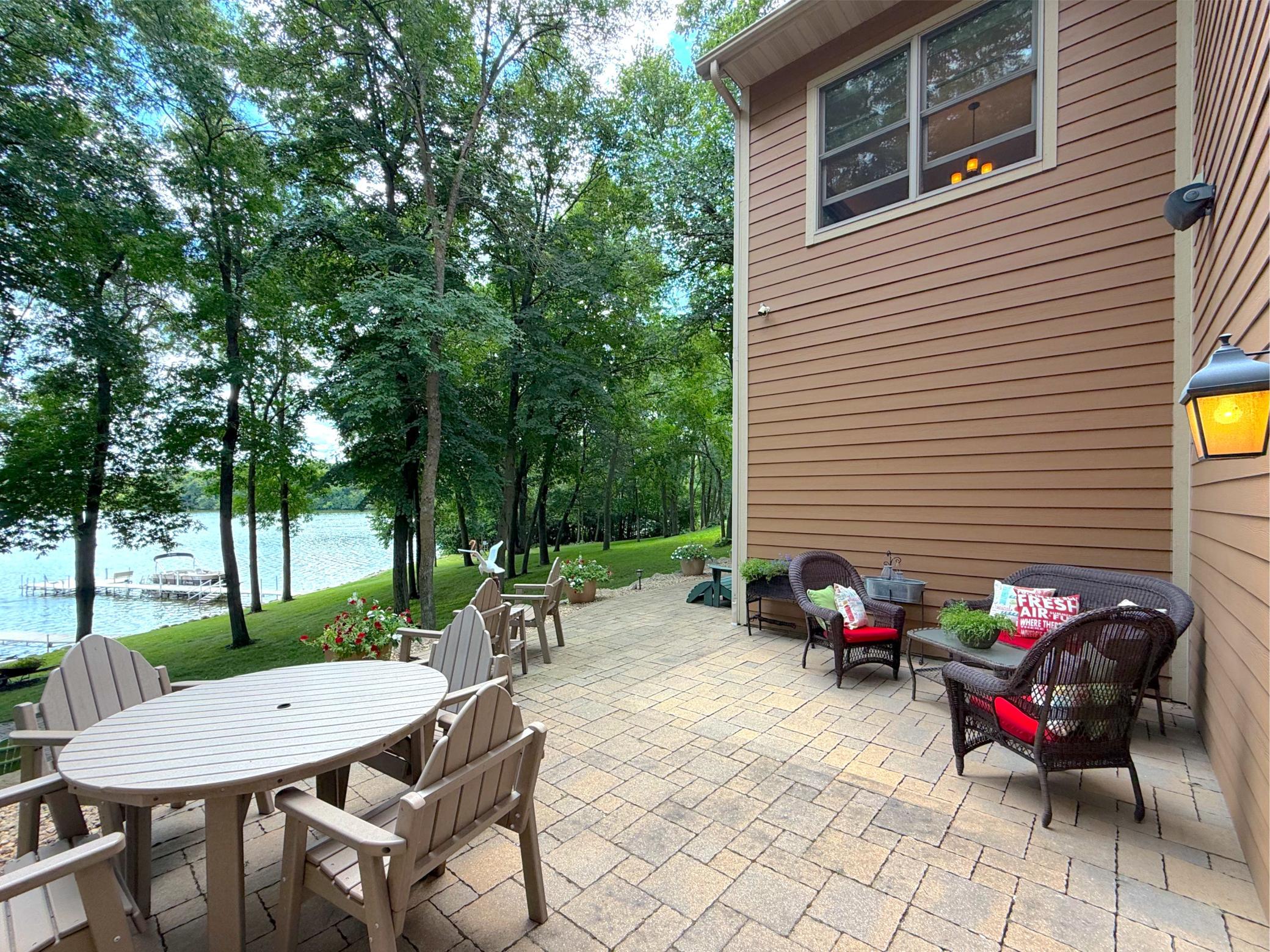 Whether hosting guests or unwinding after a day on the water, this spacious patio delivers the ultimate backdrop for lakeside living.