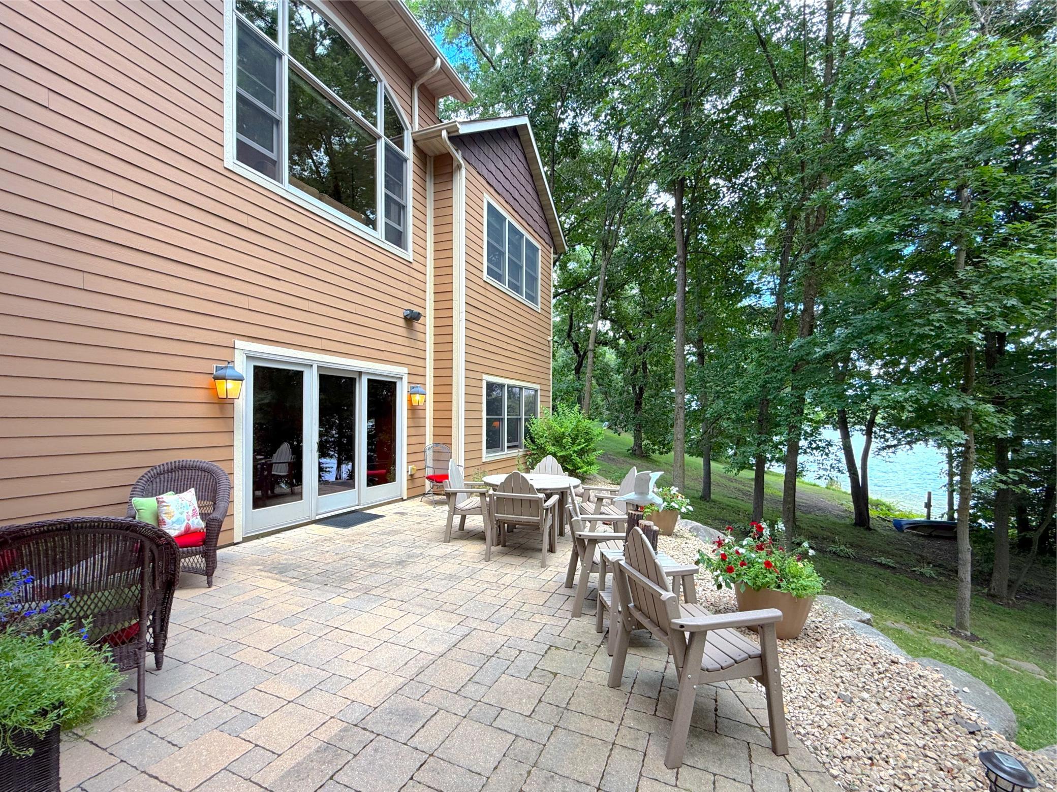 From sunset dinners to lakeside conversations, this spacious paver patio offers the perfect blend of comfort, beauty, and waterfront living.
